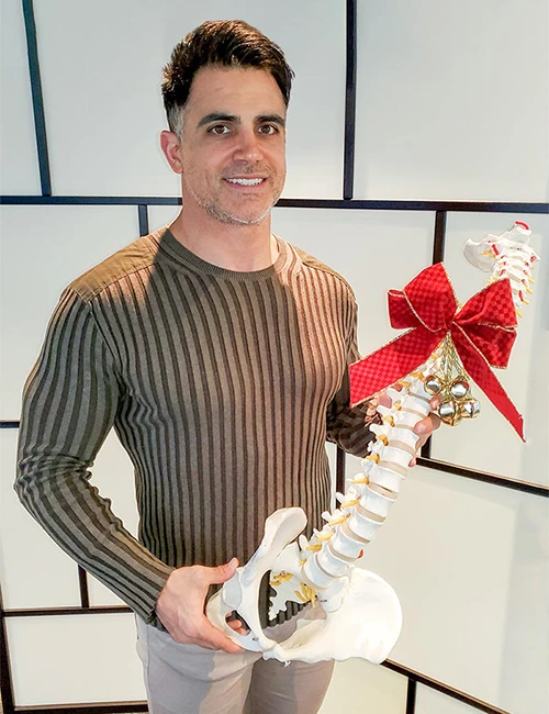 Chiropractic Calgary AB Dustin Whitney With Christmas Spine Chiropractic Calgary AB Dustin Whitney With Christmas Spine