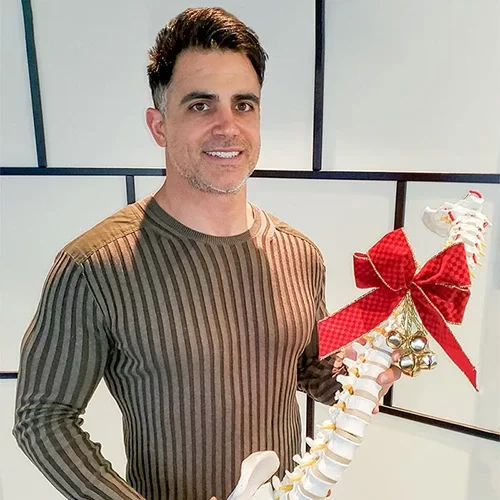 Chiropractic Calgary AB Dustin Whitney With Christmas Spine Chiropractic Calgary AB Dustin Whitney With Christmas Spine
